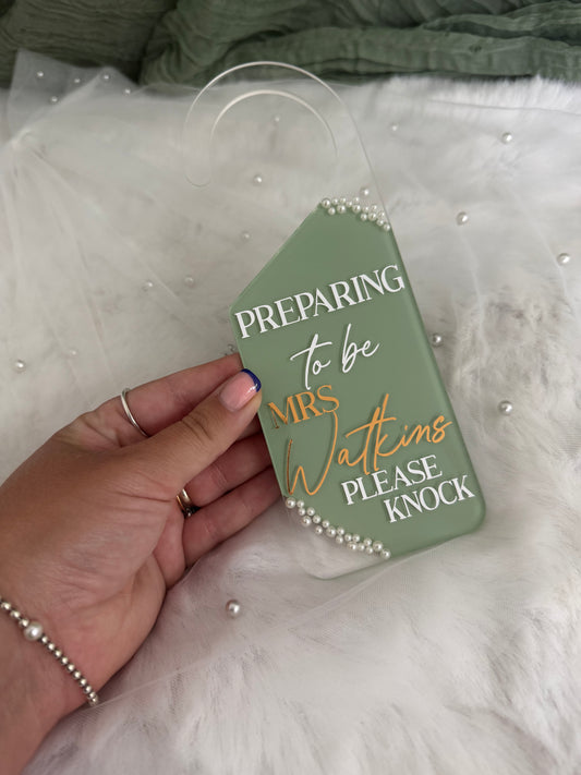 Preparing to be door hanger