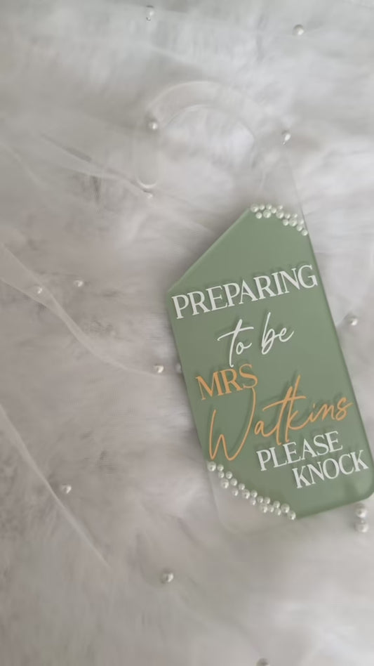 Preparing to be door hanger